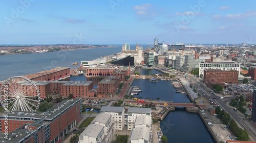 liverpool aerial view fly forward over albert dock sunny day uk england photo