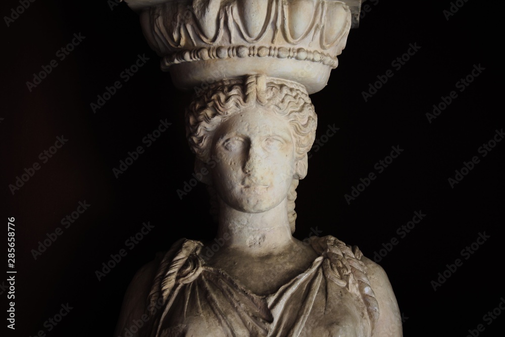 Caryatid marble statue