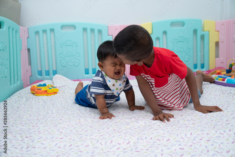 Fototapeta premium Cute two little boy play in room