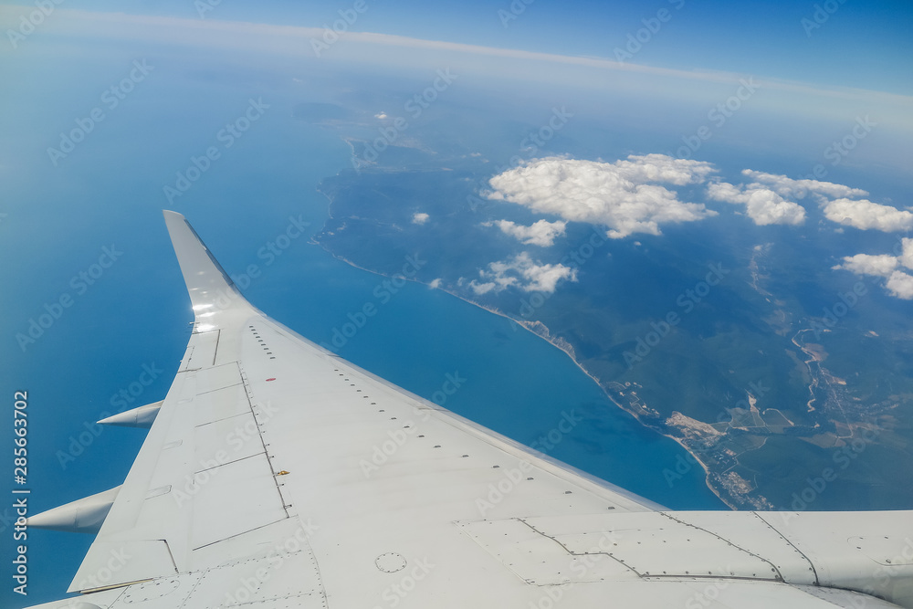 View from the plane to the coastal part and sea