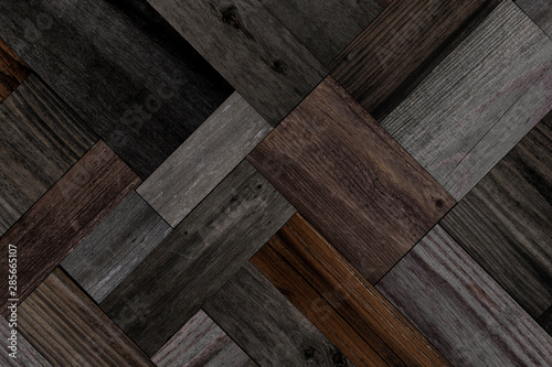 Wood texture for background. Dark parquet floor with abstract pattern. 