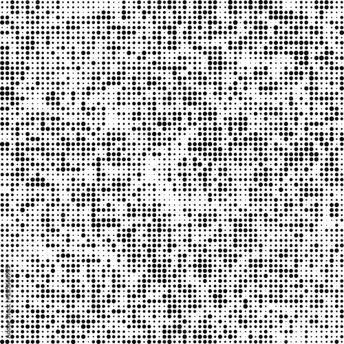 Abstract halftone texture. Chaotic background of black dots on white