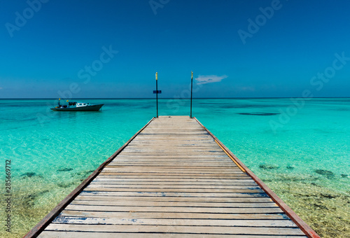 View from a pier in the Maldives © Geoff Hyslop
