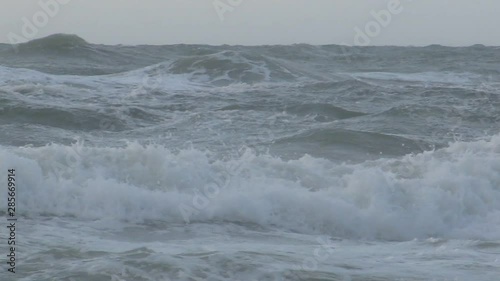 waves breaking on beach