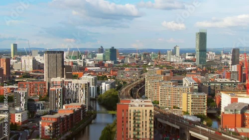 manchester aerial view rising forward over city centre reveal shot england photo