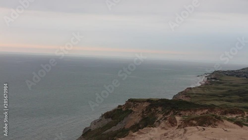 sunset on coast of sea