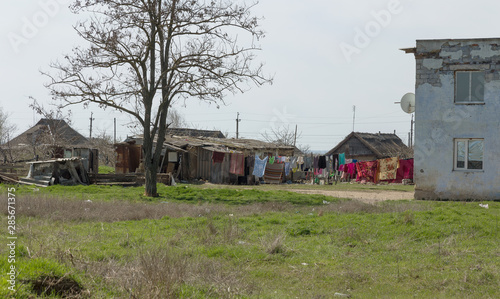 Homes in poor neighborhood where poor people live. Destruction of old houses, earthquakes, economic crisis, abandoned houses. Living in broken, unusable house is poor quarter. Odessa, Ukraine, 2019