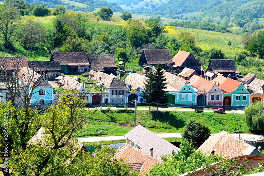 Typical rural landscape and peasant houses in  the village Alma Vii (Almen) Transylvania, Romania. The settlement was founded by the Saxon colonists in the middle of the 12th century