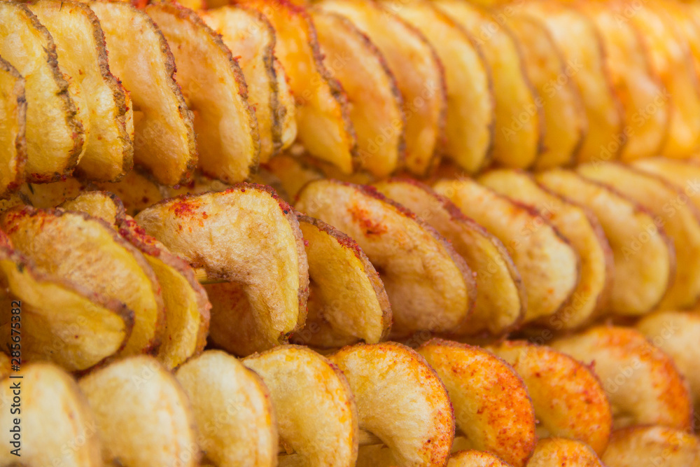potato chips fried on skewers with spices