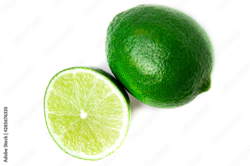 Juicy green lime and haft citrus isolated on white background. Healthy food concept