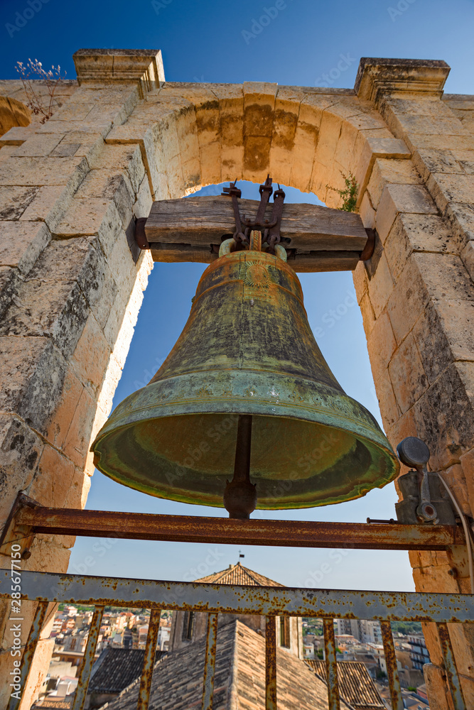 Bell of the baroque bell tower of the church of S. Carlo in the historic center of Noto in Sicily, Italy.