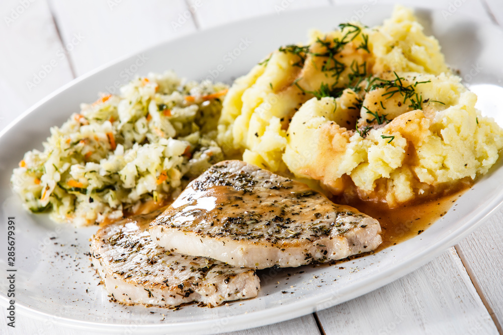 Fried pork chop, mashed potatoes and cabbageon Fried pork chop, mashed potatoes and cabbageon