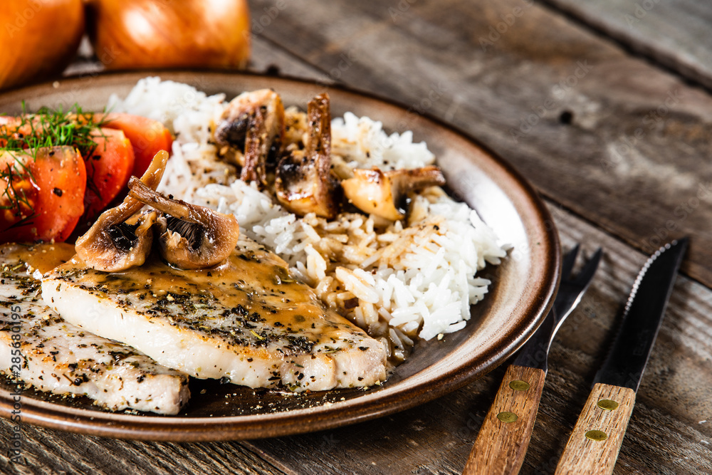 Grilled pork chop with white rice and mushroomson Grilled pork chop with white rice and mushroomson