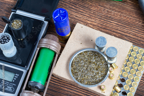 Canvas Print Shotgun shells reloading process with special reload equipment