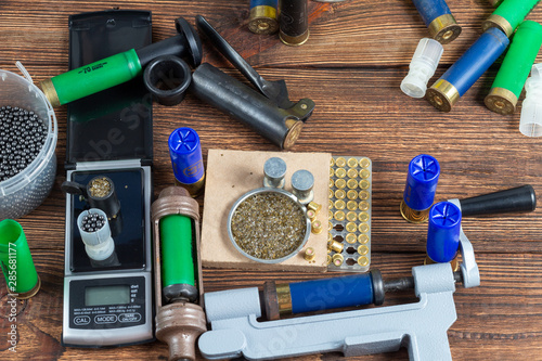 Canvas Print Shotgun shells reloading process with special reload equipment