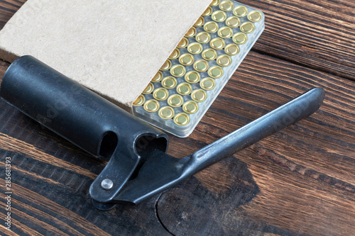 Canvas Print Shotgun shells reloading process with special reload equipment