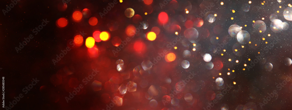 Fototapeta tło abstrakcyjne światła czerwonego brokatu. nieostry. transparent