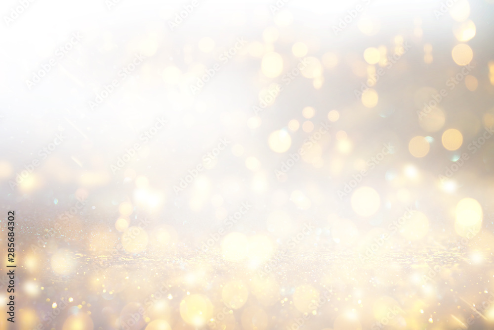 background of abstract glitter lights. silver and gold. de-focused background of abstract glitter lights. silver and gold. de-focused