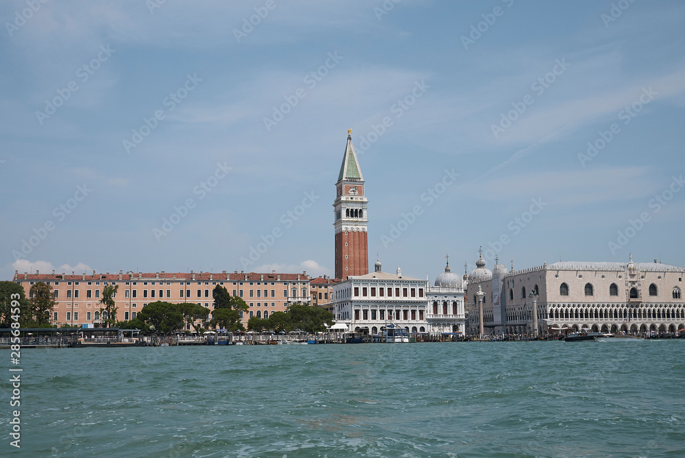 Venice, Italy - July 02, 2019 :  View of Piazza San Marco and palazzo Ducale from the ferry boat