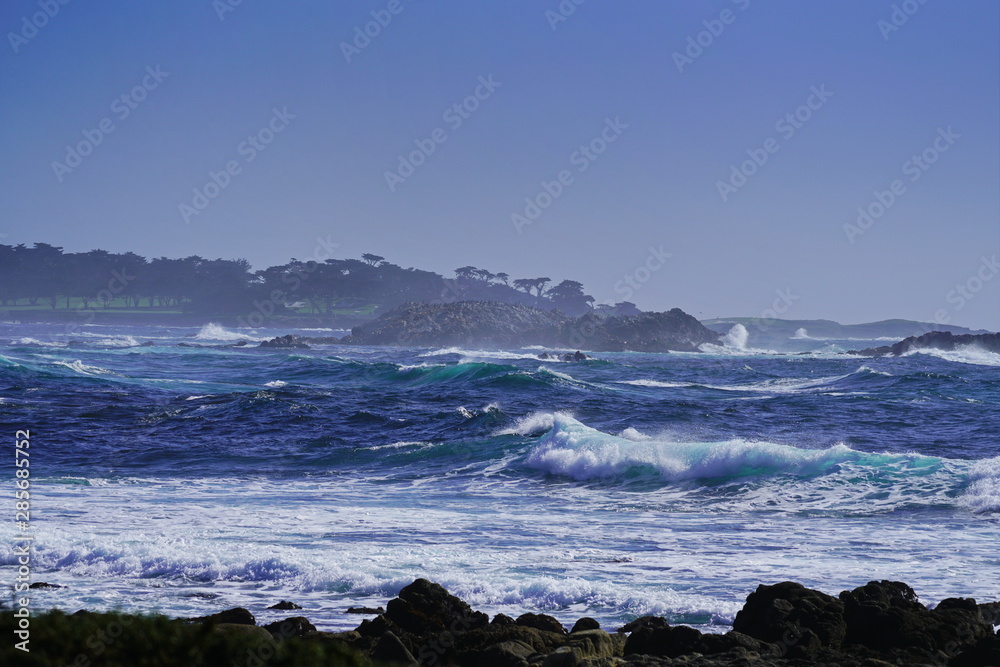 Beautiful coastline scenery with ocean waves and rocks on Pacific Coast, California, US