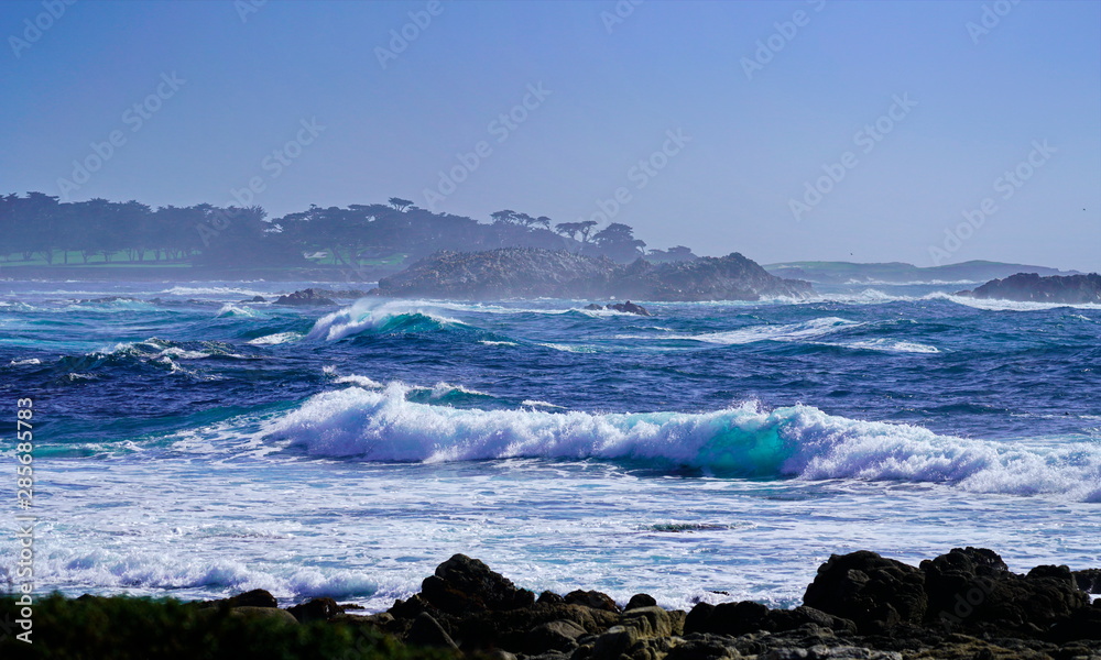 Beautiful coastline scenery with ocean waves and rocks on Pacific Coast, California, US Beautiful coastline scenery with ocean waves and rocks on Pacific Coast, California, US