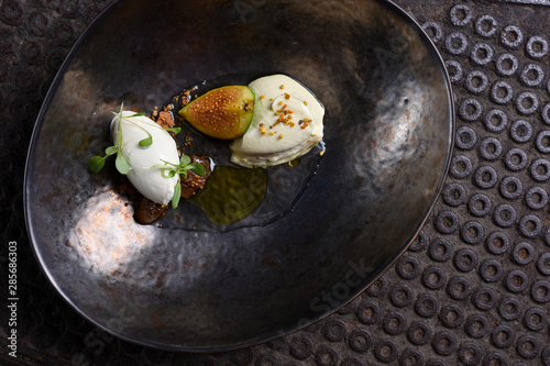 Fine dining dessert, Figs ,caramel ice cream, white chocolate mousse and spices