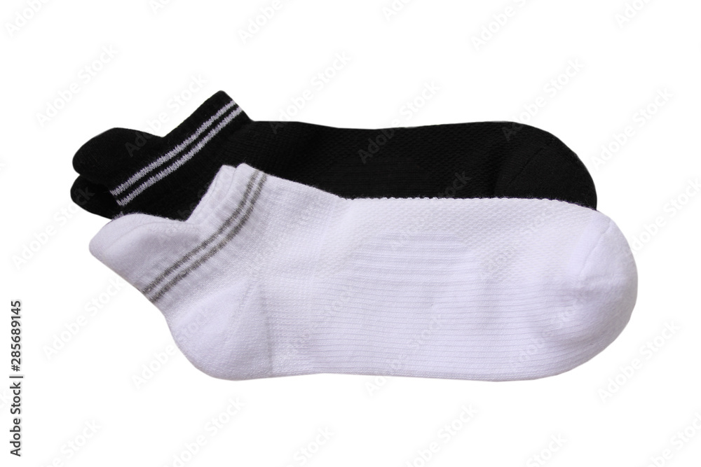 2 pairs of white and black sports short socks with stripes on a white background, isolate 2 pairs of white and black sports short socks with stripes on a white background, isolate