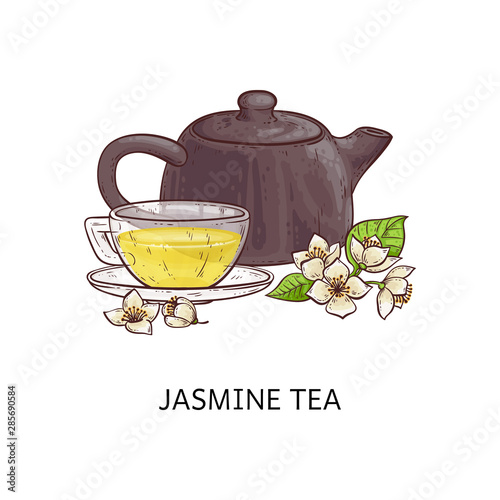 Jasmine tea - hot yellow beverage in glass cup, pretty flowers with leaves and brown teapot