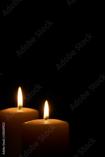 Candle flame close up on a black background