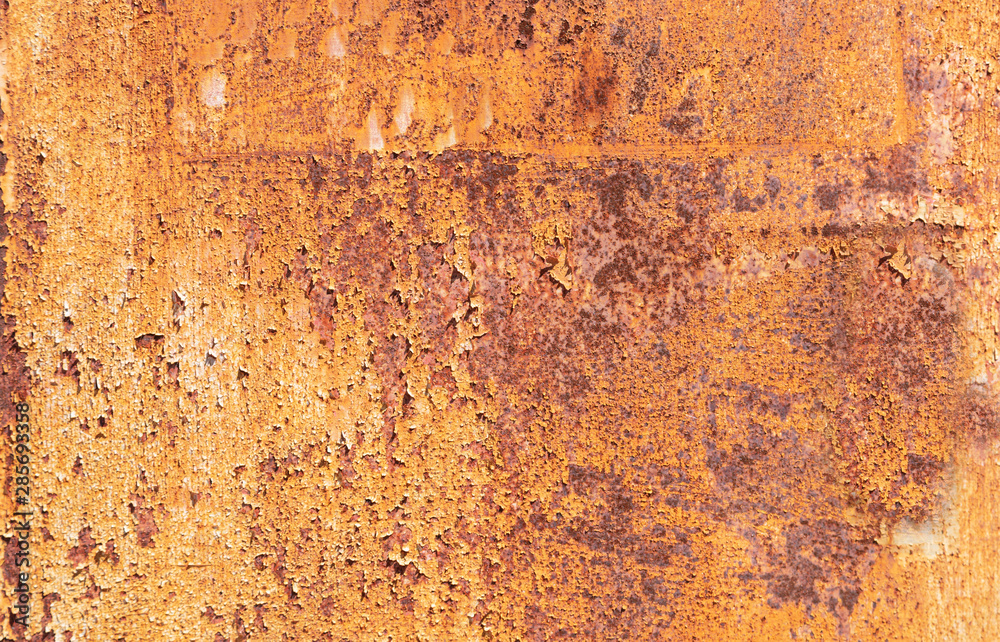 Metal rusty background texture. Heavy industrial steel plate corroded and peeled