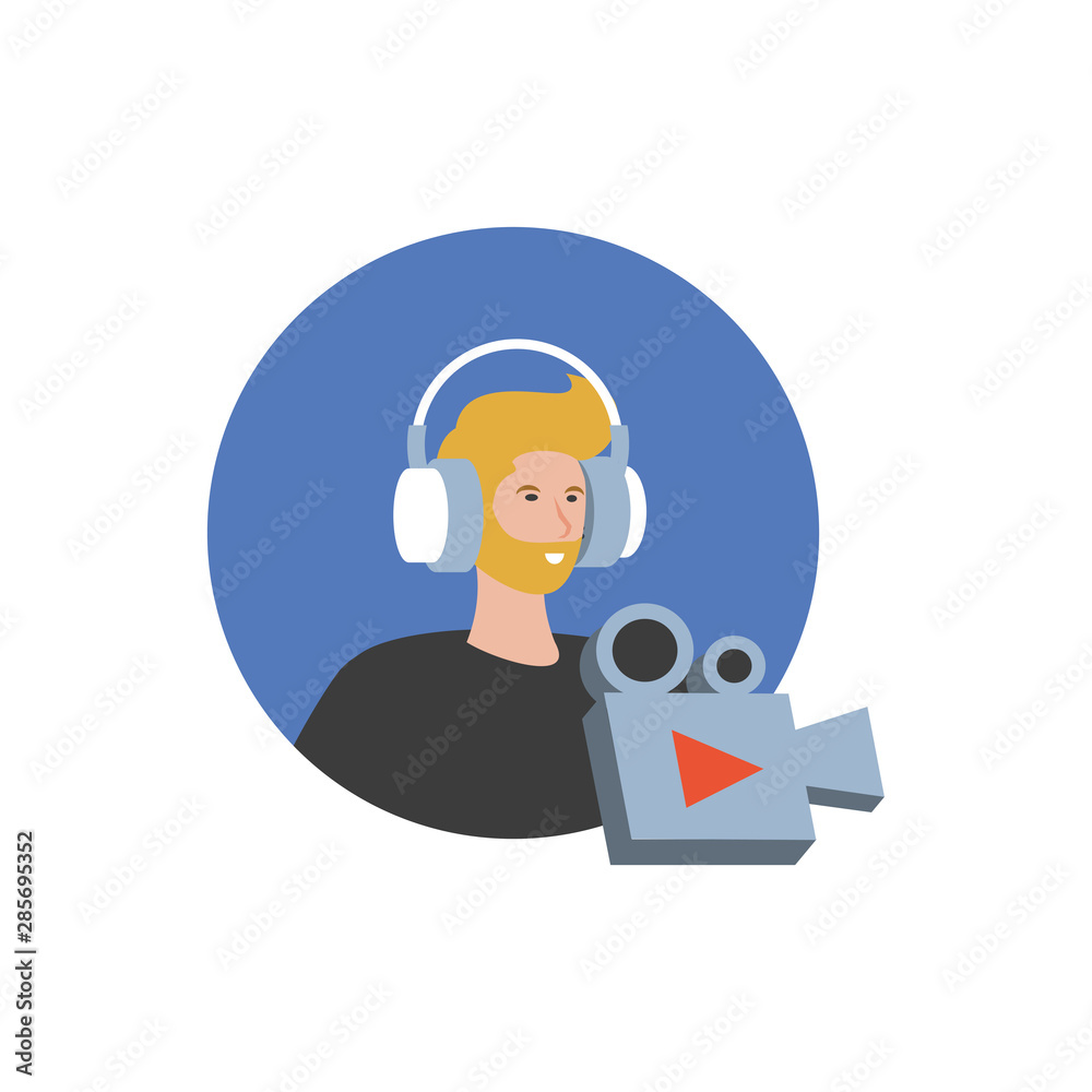 young man with earphones and video camera young man with earphones and video camera