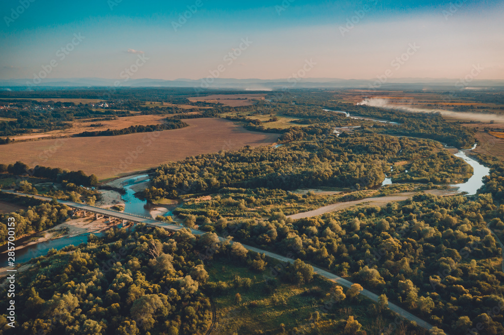 Summer rural landscape, aerial view,Forest and river from drone flight.