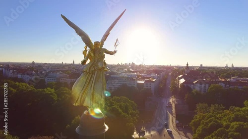 Aerial around the beautiful golden Angel Of Peace, Maximillian Park in the Munich Germany suburb of Bogenhausen. photo