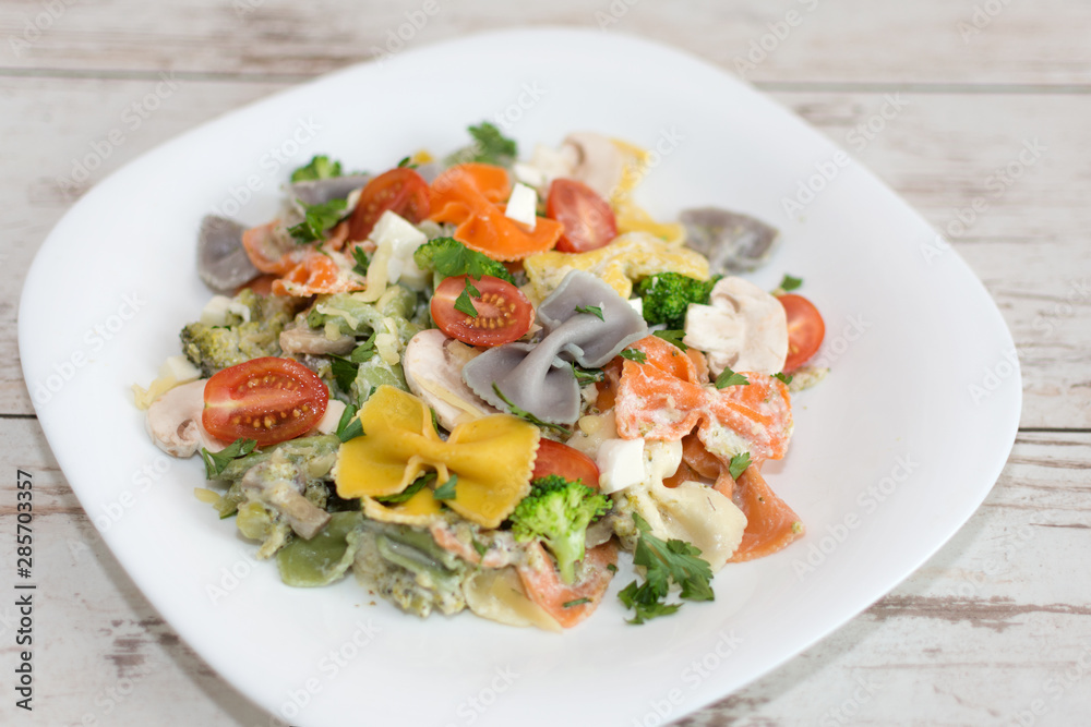 Italian colorful bow tie farfalle pasta with sauce. Italian colorful bow tie farfalle pasta with sauce.