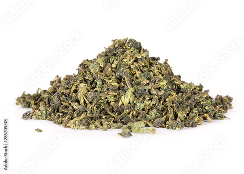 Milk Oolong green leaf tea, high angle view isolated on white background