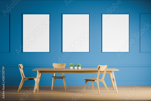 Blue dining room interior with poster gallery