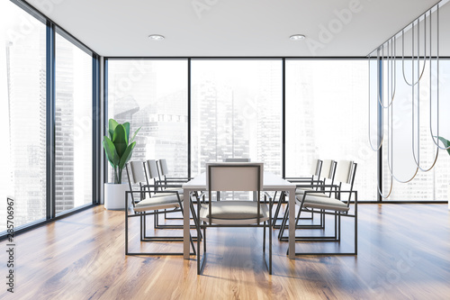 Panoramic meeting room with white chairs