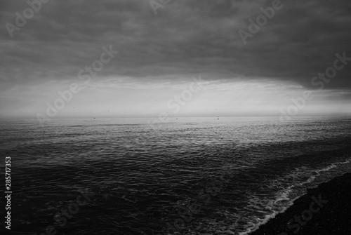 Dark Stormy Cloudy Rocky Pebble Beach Sunset Black And White