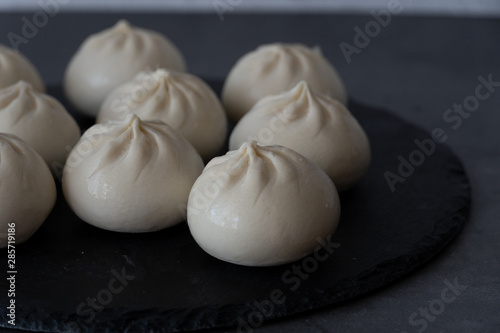 Georgian traditional dumplings khinkali with meat. Closeup.  photo