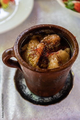 Conical pot of piti soup in Sheki, Azerbaijan. photo
