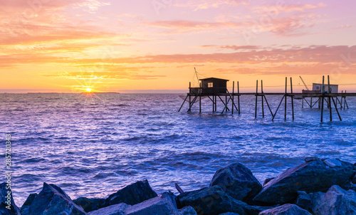 Huts of fishermen in the sunset