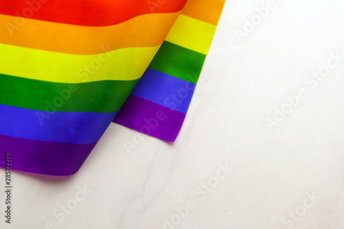 LGBT flag on light background