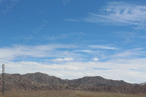 Cloud patterns over the Bullion Mountains in Cleghorn Lakes Wilderness of the Southern Mojave Desert.