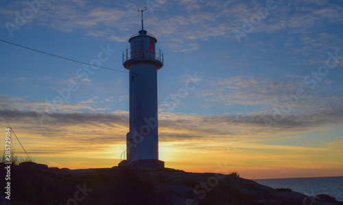 The lighthouse and the sunset