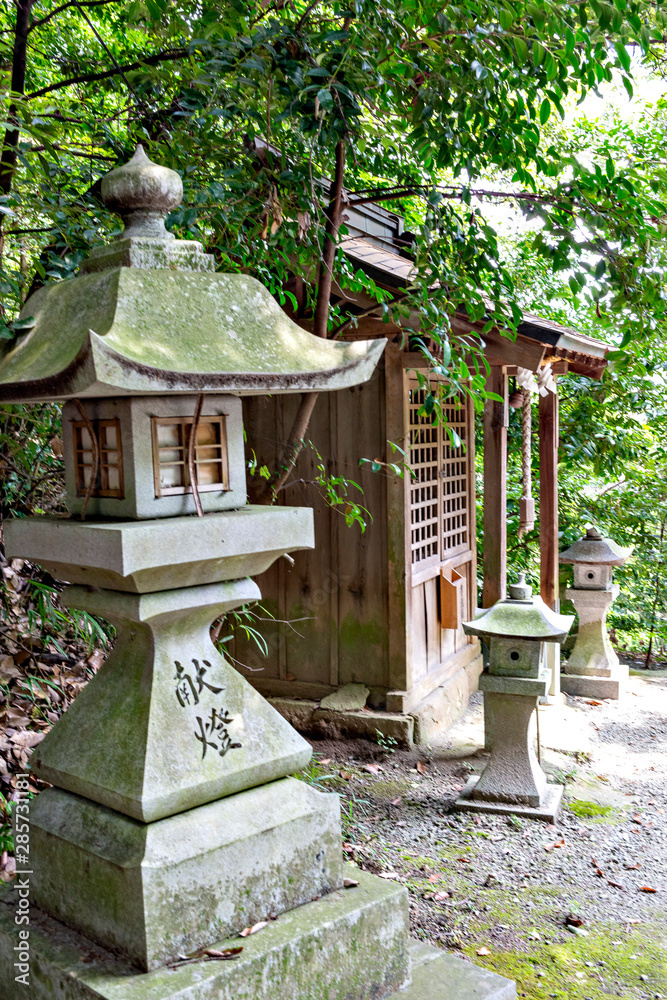 Stone lantern at Siota hachiman-gu shrine in Kobe, Hyogo, Japan Stone lantern at Siota hachiman-gu shrine in Kobe, Hyogo, Japan