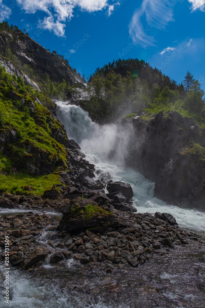 Latefossen (Latefoss) twin waterfall - one of the biggest waterfalls in Norway, nearby Odda. HDR image, july 2019 Latefossen (Latefoss) twin waterfall - one of the biggest waterfalls in Norway, nearby Odda. HDR image, july 2019