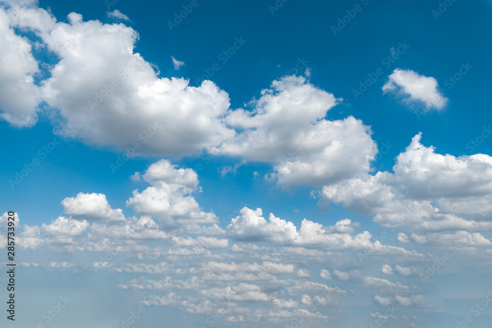 Blue sky and white clouds under the sun