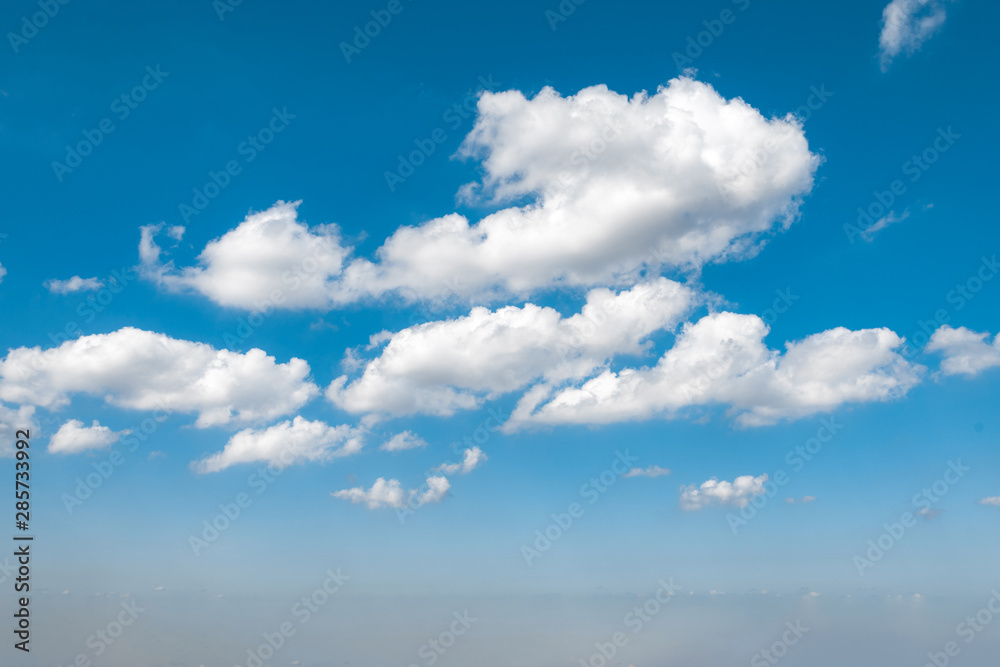 Blue sky and white clouds under the sun Blue sky and white clouds under the sun