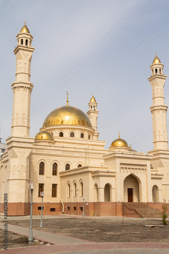 Petropavlovsk, Kazakhstan - May 6, 2019: Muslim mosque, golden domes.