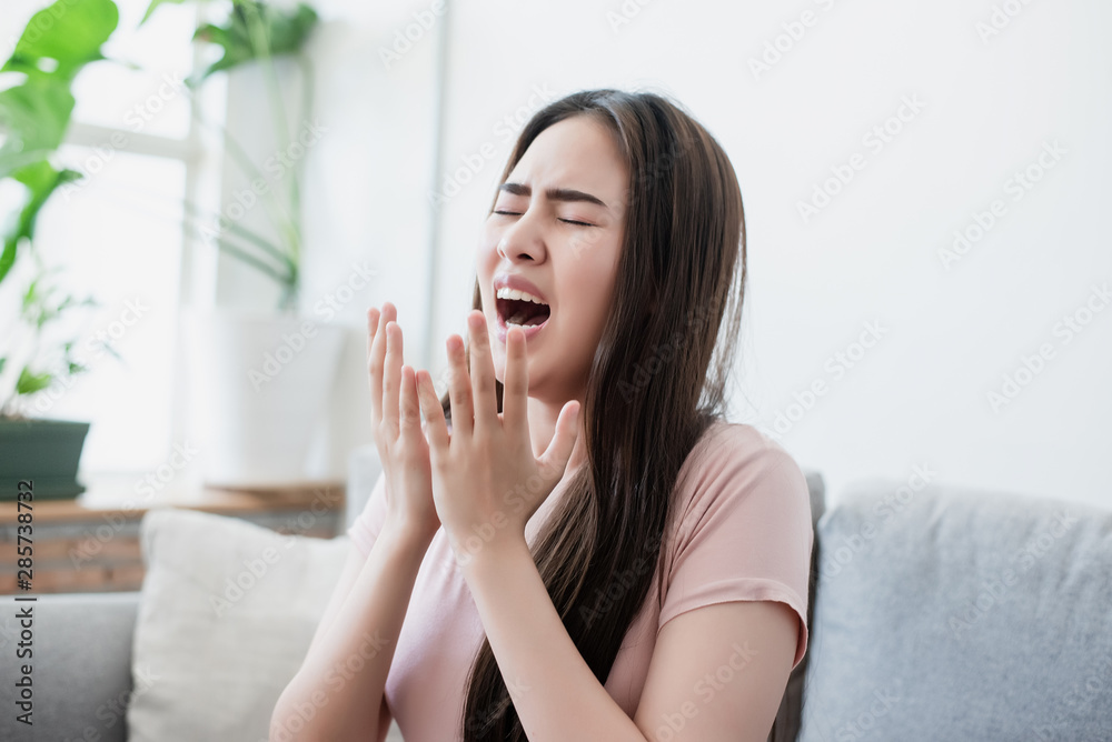 Asian teenage girl was sick and sneezing violently. Asian teenage girl was sick and sneezing violently.